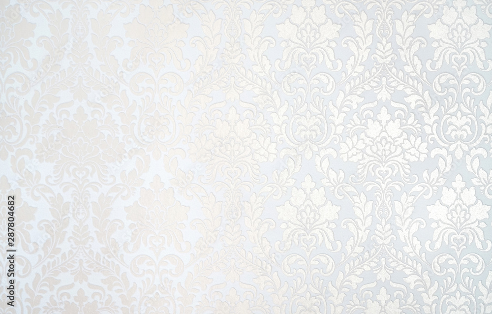 Beautiful texture of paper Wallpaper embossed in form of a classic floral ornament in light golden b