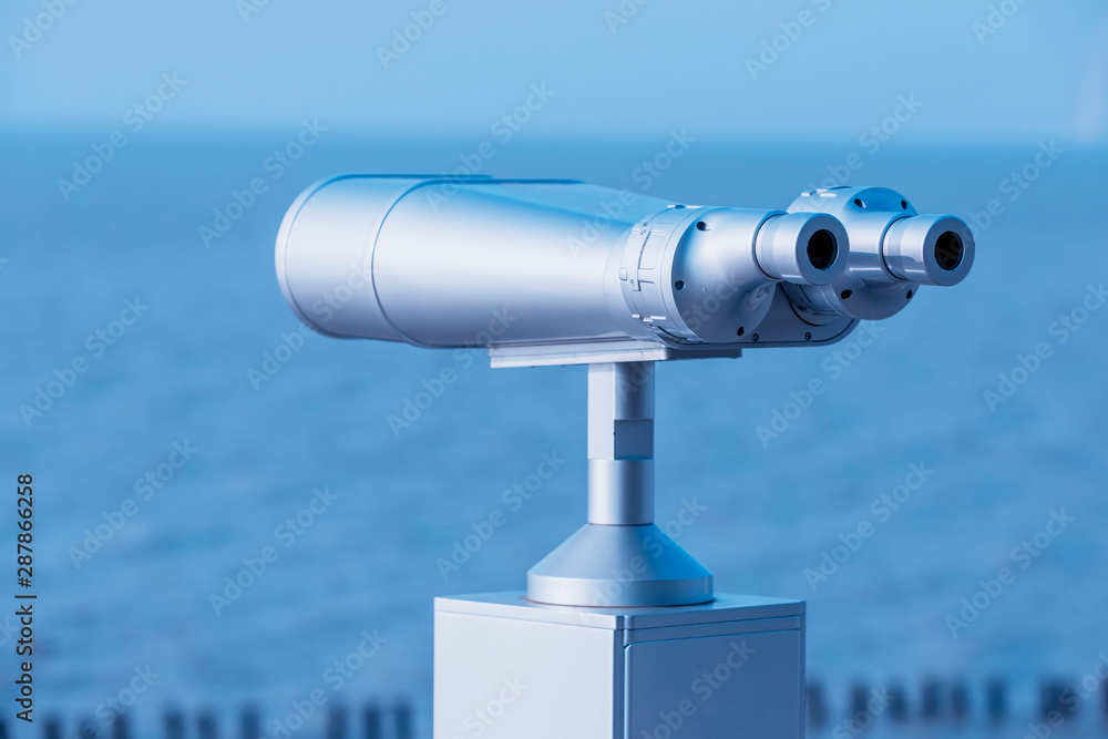 coin-operated telescope or binocular for looking