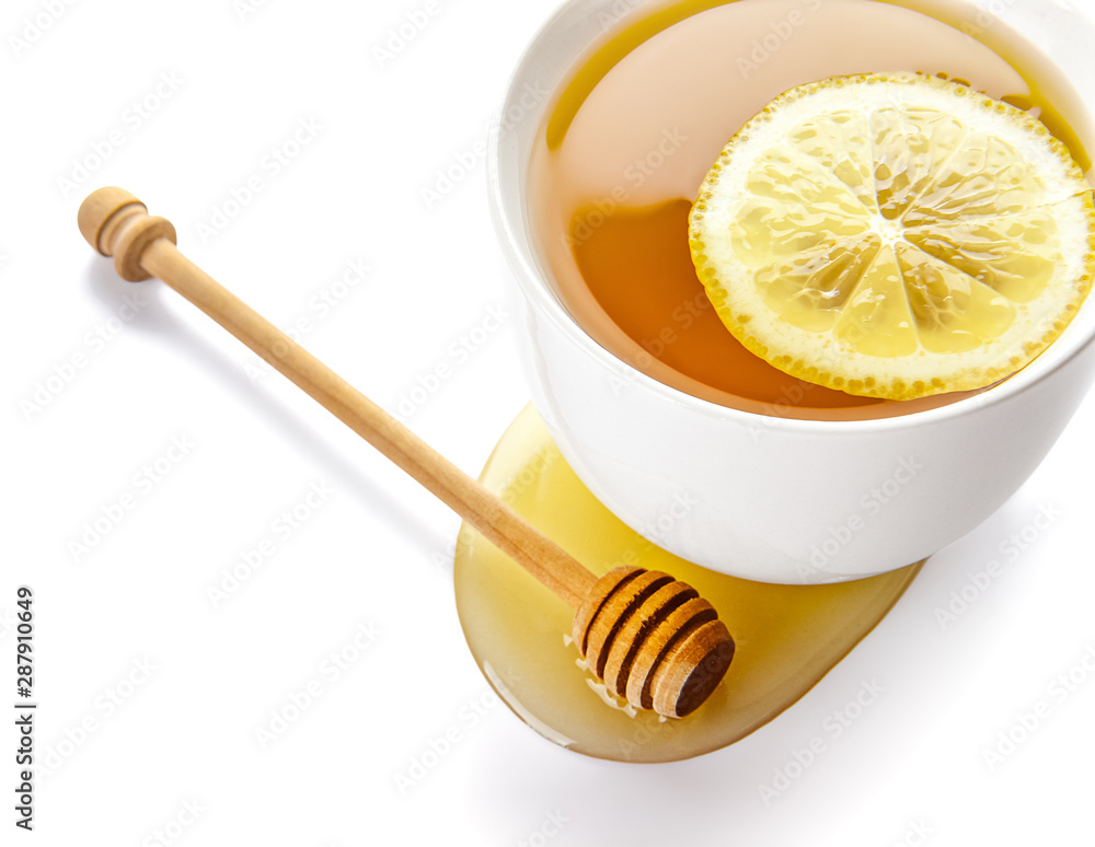 Cup of tasty tea with honey and lemon on white background