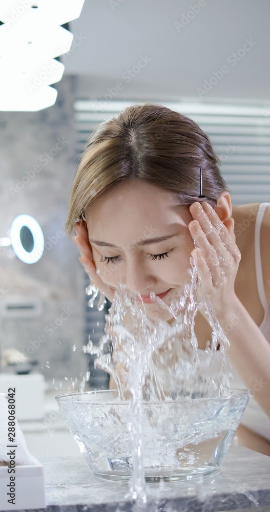 beauty woman wash her face