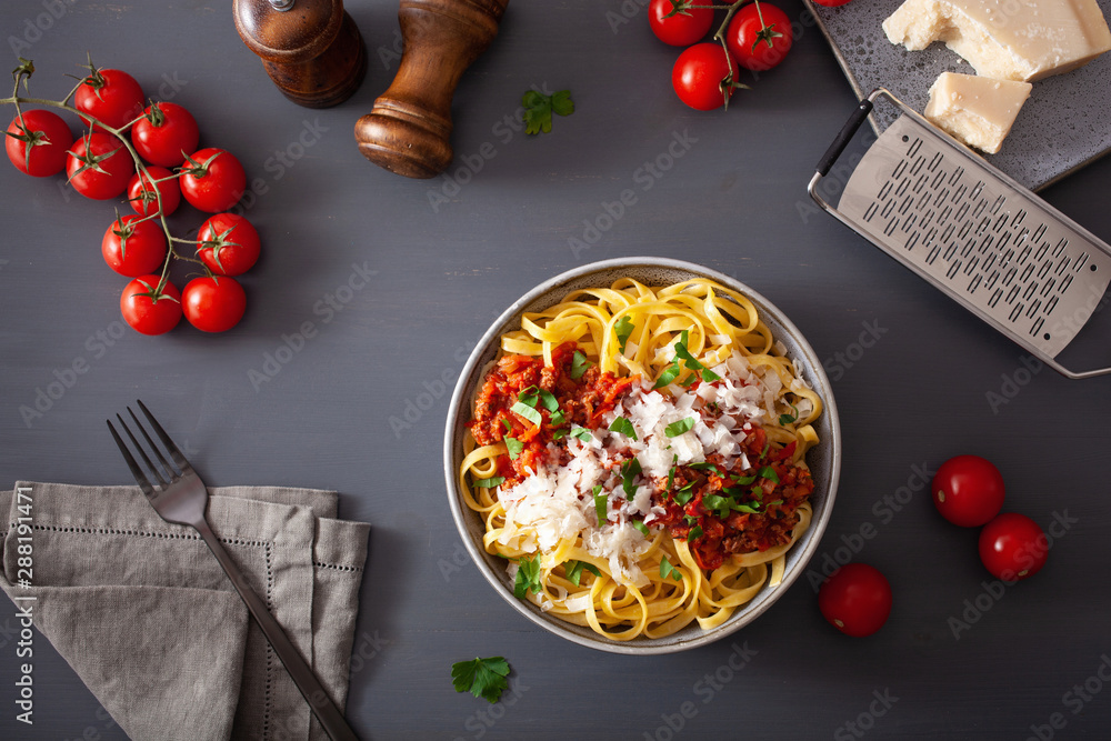 tagliatelle bolognese with herbs and parmesan, italian pasta