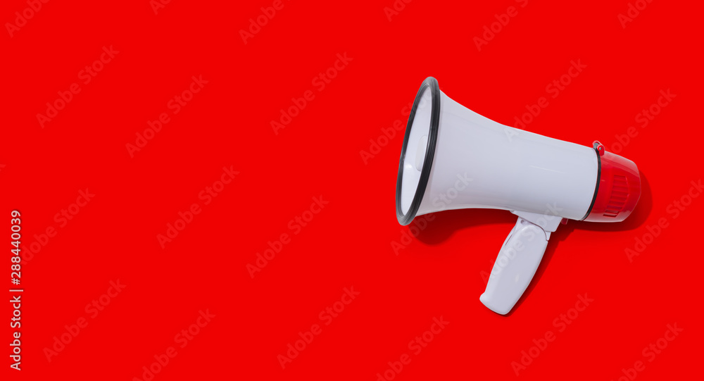 White megaphone with hard shadow overhead view