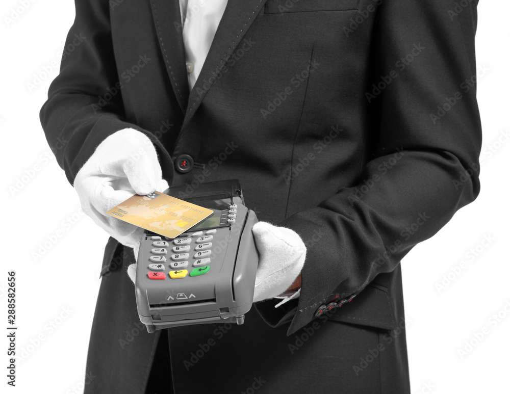 Handsome waiter with payment terminal on white background, closeup