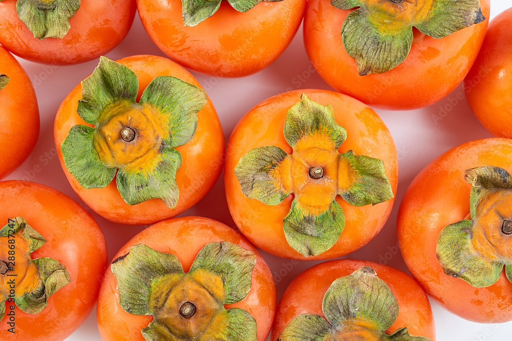 Fresh fruit red persimmon on white background