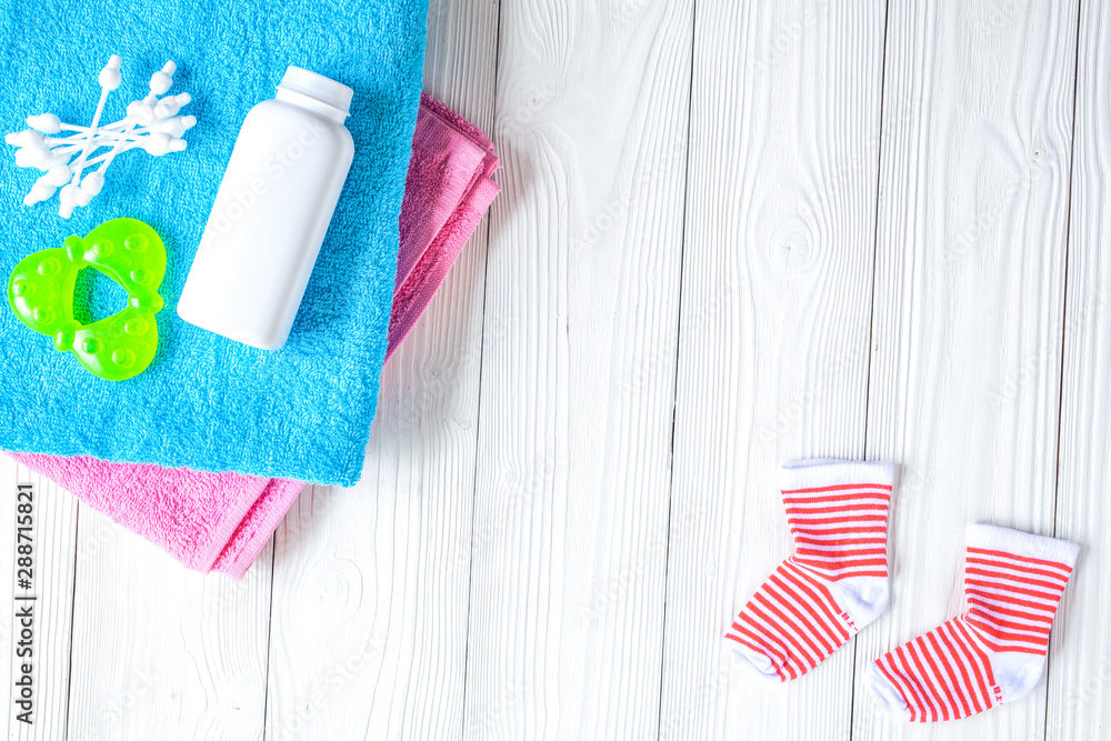 baby accessories for bath on wooden background