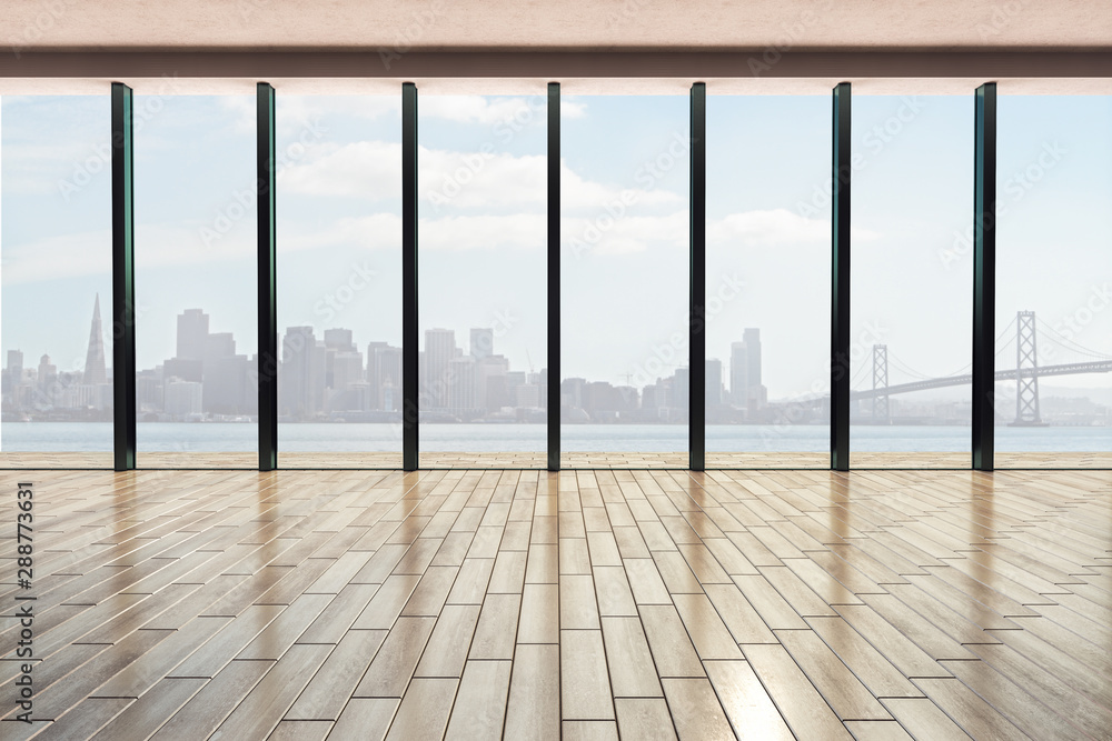 Contemporary office interior with wooden floor, glass walls and city view background at sunrise.