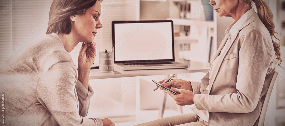 Woman talking with therapist