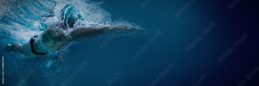 Fit swimmer training by himself