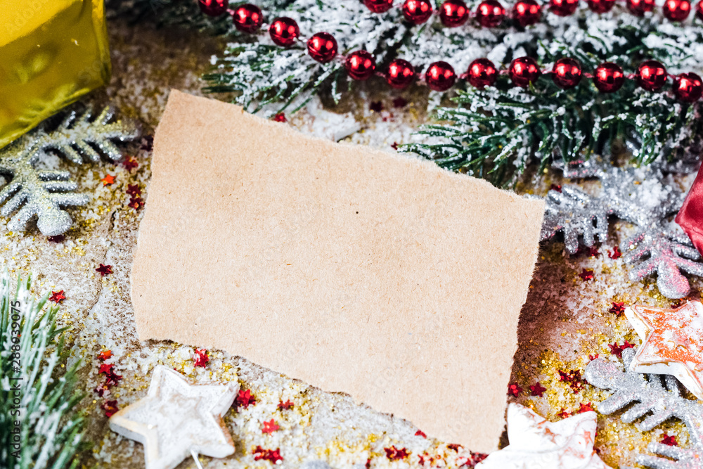 kraft paper and christmas tree decorations close up