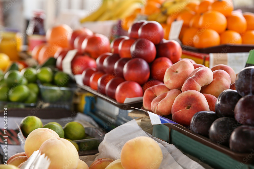 Assortment of fresh fruits on counter at market