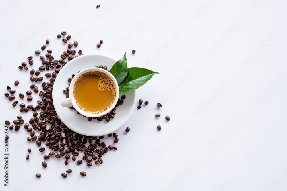 Top view of Hot espresso and coffee bean on white table