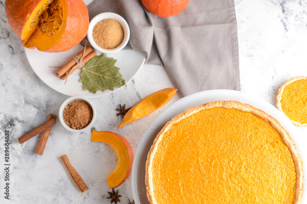 Composition with tasty pumpkin pie on table