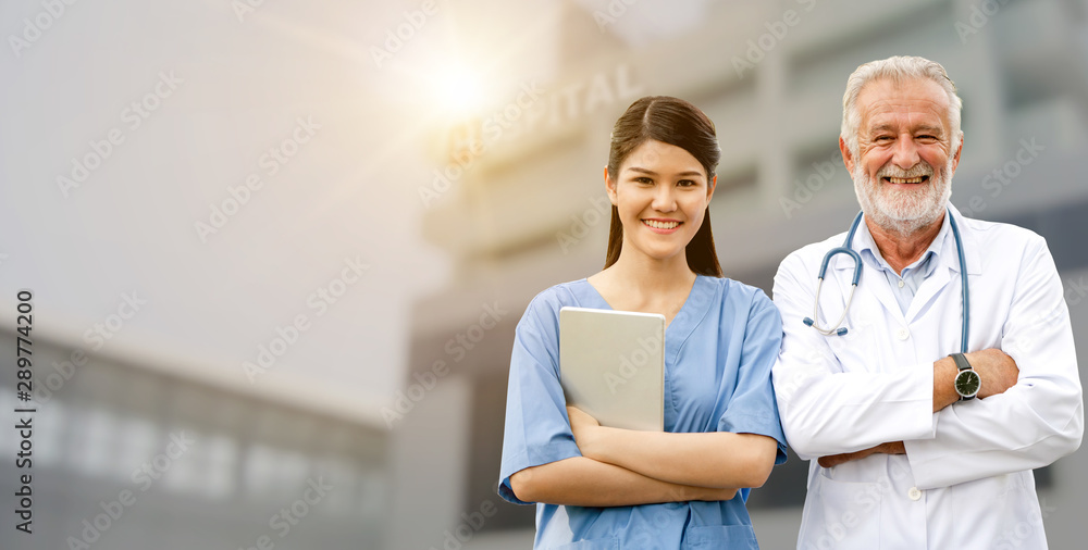 Senior doctor working with young doctor in the hospital. Medical healthcare staff and doctor service