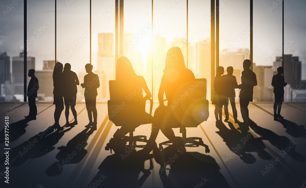 Double exposure image of many business people conference group meeting on city office building in ba