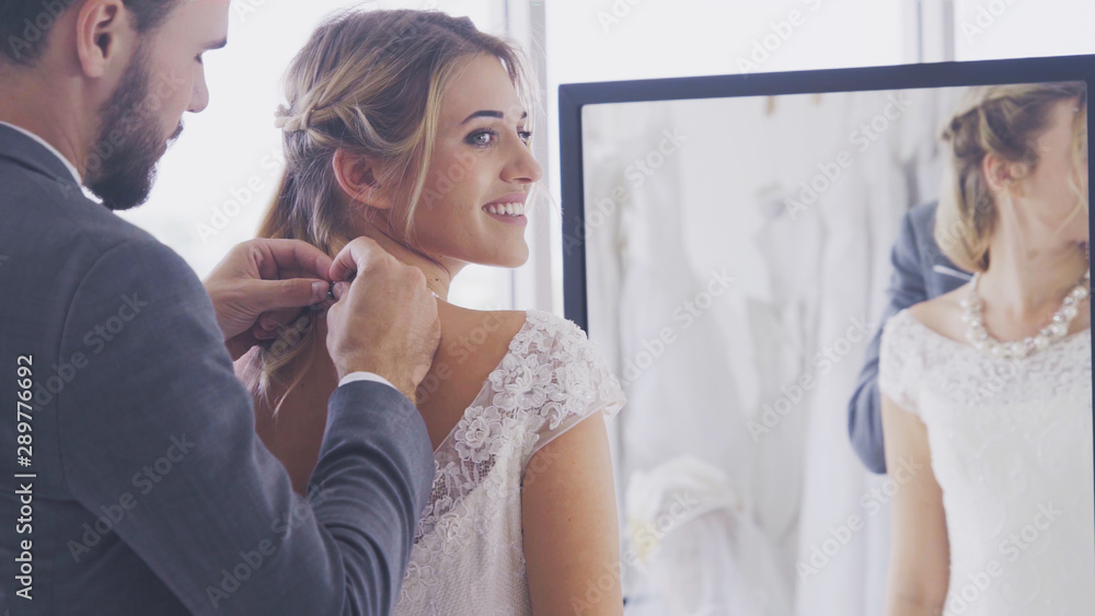 Happy bride and groom in wedding dress prepare for married in wedding ceremony. Romantic love of man