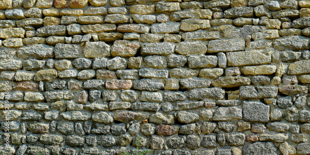  close up of wall of stone in the south of france