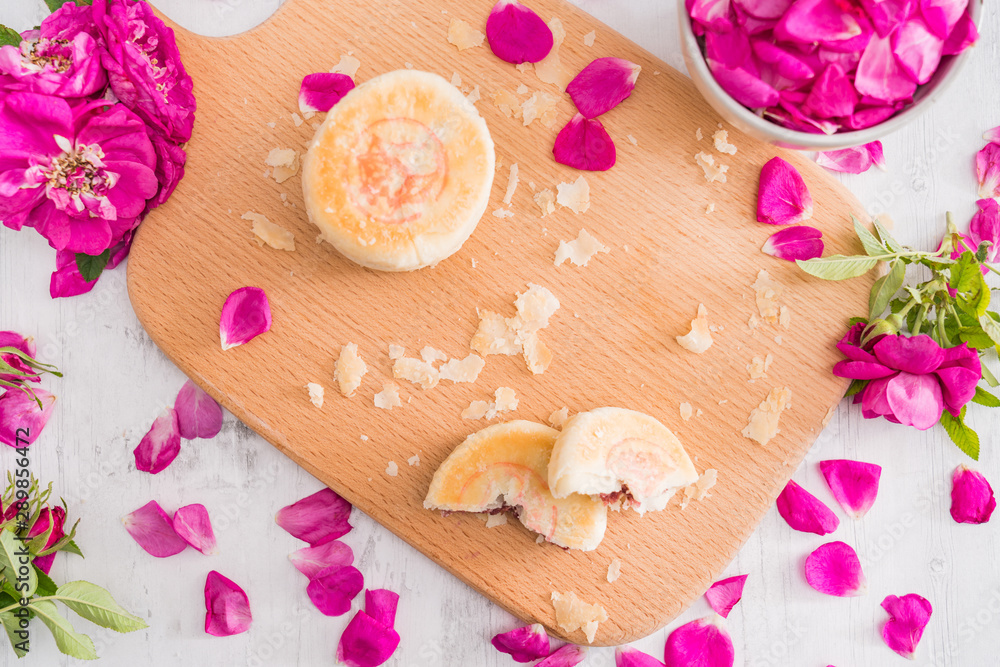 Fresh flower cake of Yunnan, China on the cutting board 