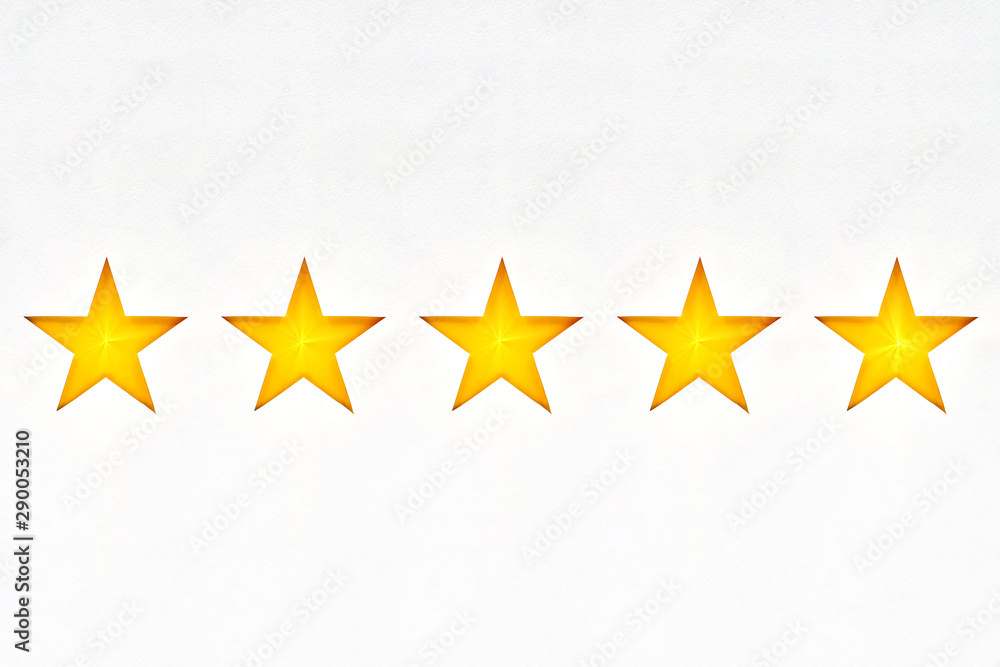 Shining five star symbol, hand made from cardboard, the concept of a positive rating, reviews and fe