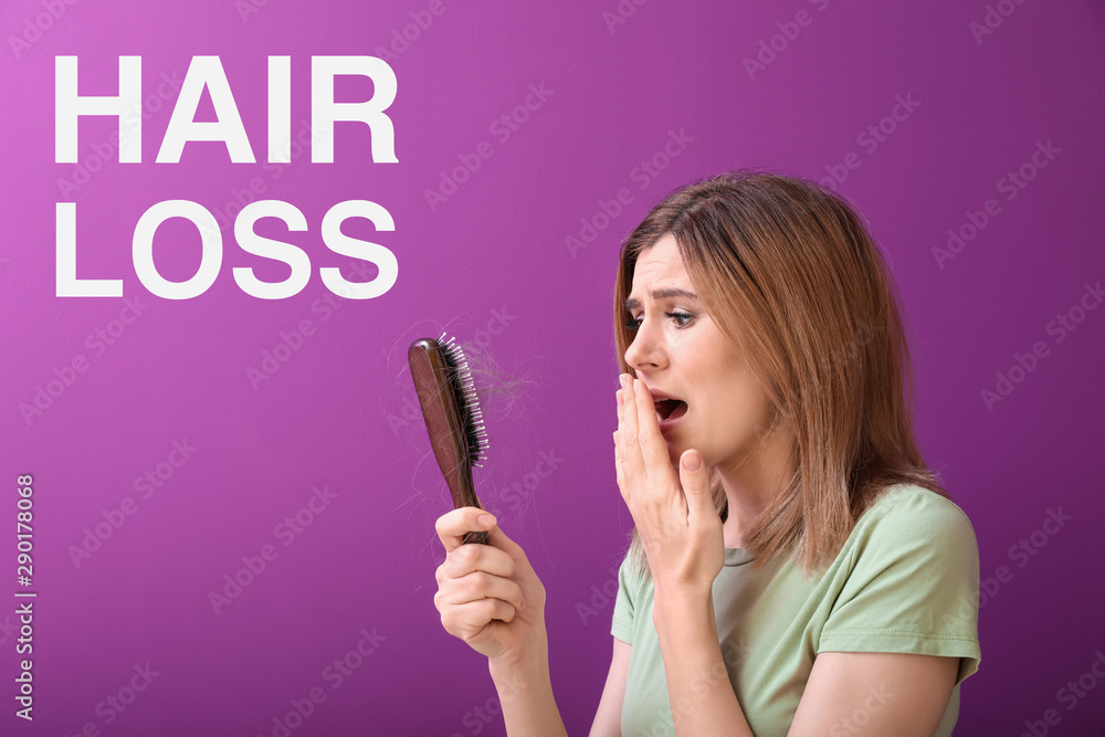 Woman with hair loss problem on color background