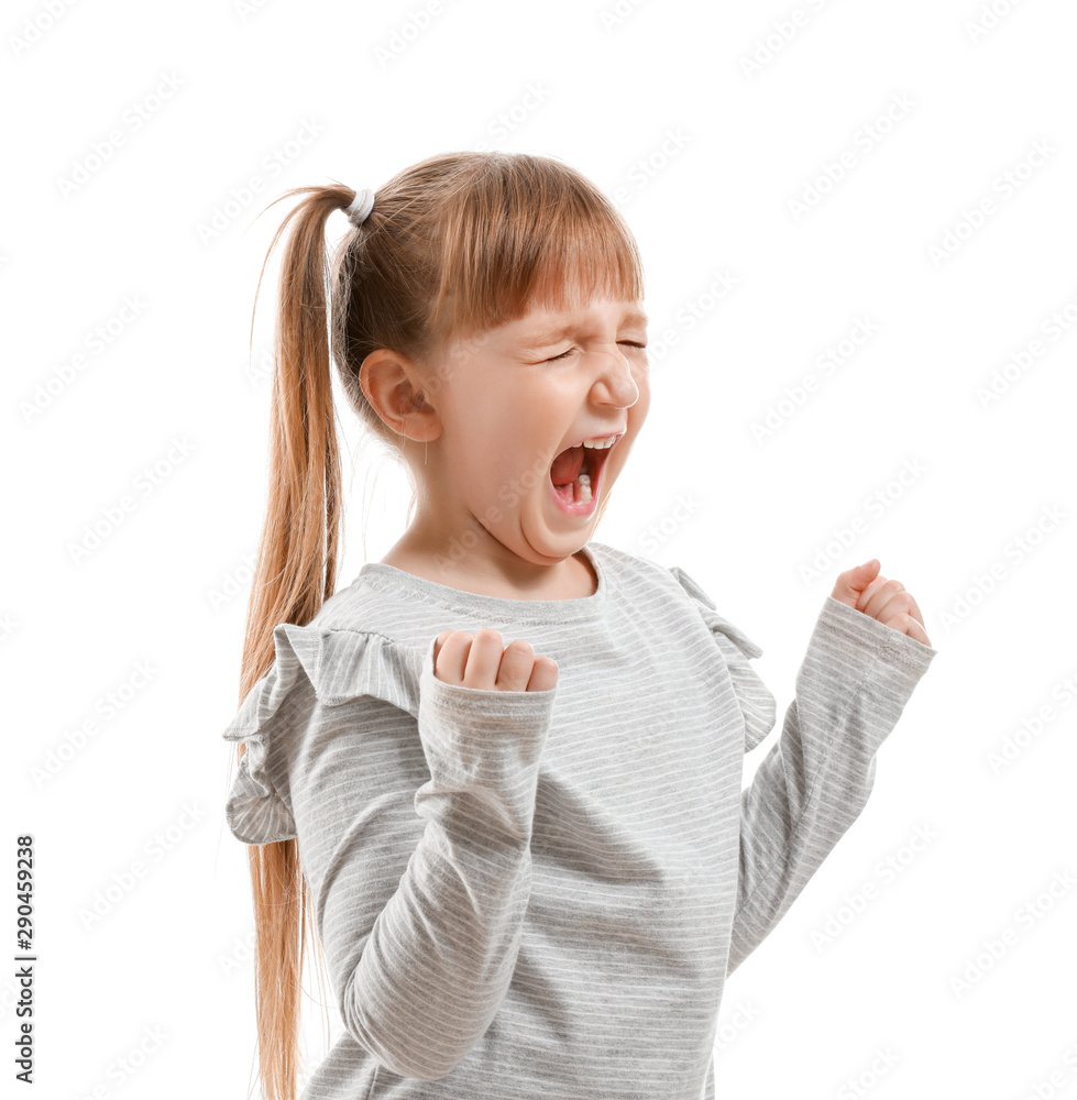 Portrait of angry little girl on white background