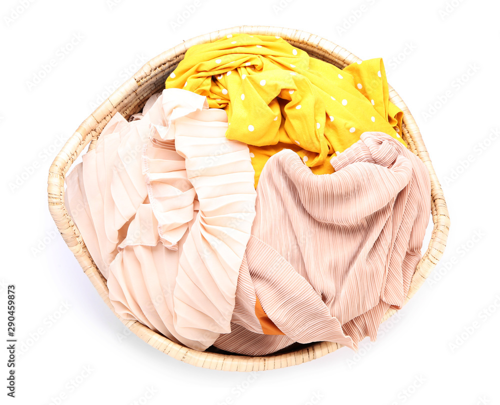 Basket with laundry on white background