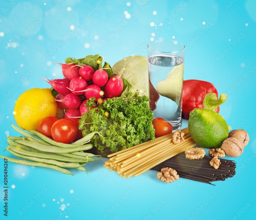 Fresh tasty vegetables with water on background