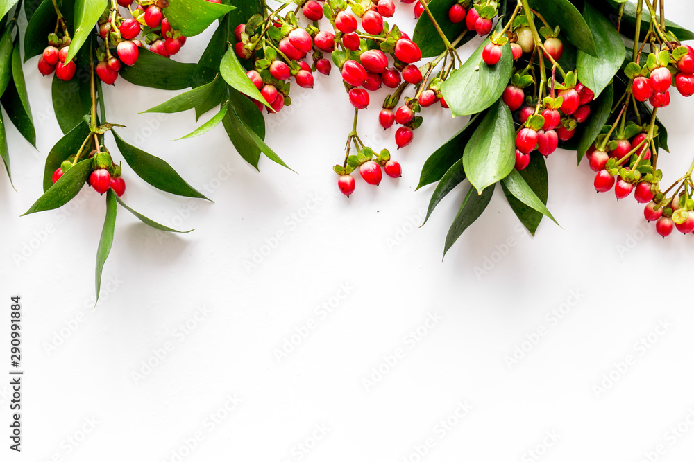 Summer pattern with green plants and red berries on white background top view mockup