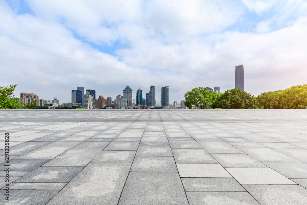 Shanghai skyline and empty square floor in city park