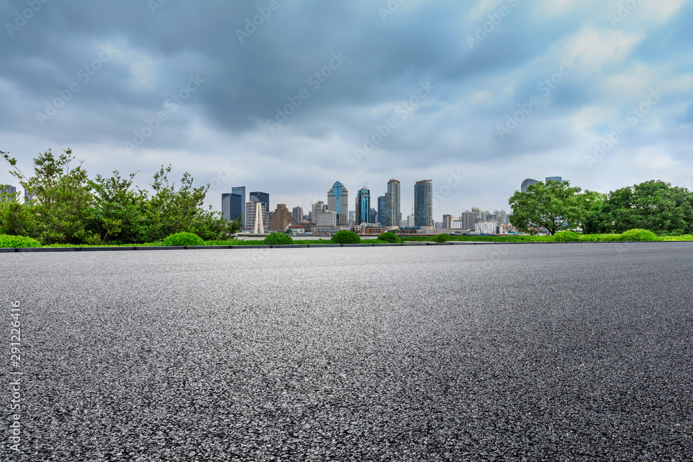 Empty asphalt highway and city skyline with buildings in Shanghai,China.