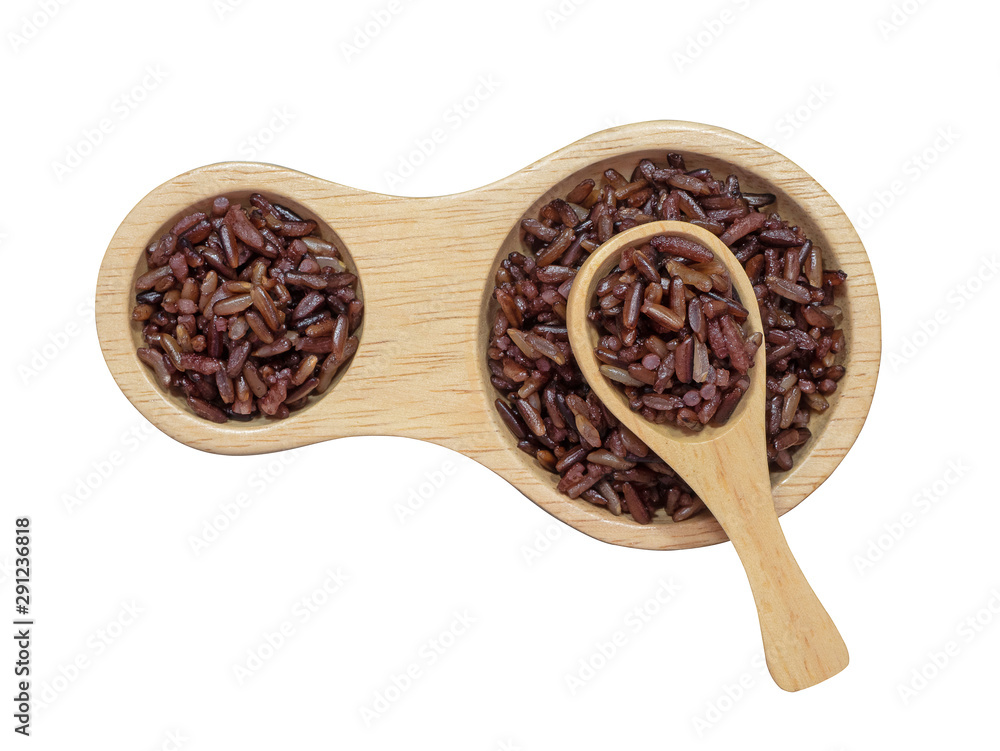 Cooked brown rice or riceberry rice attractive to eat  in wooden spoon and wooden bowl  isolated on 