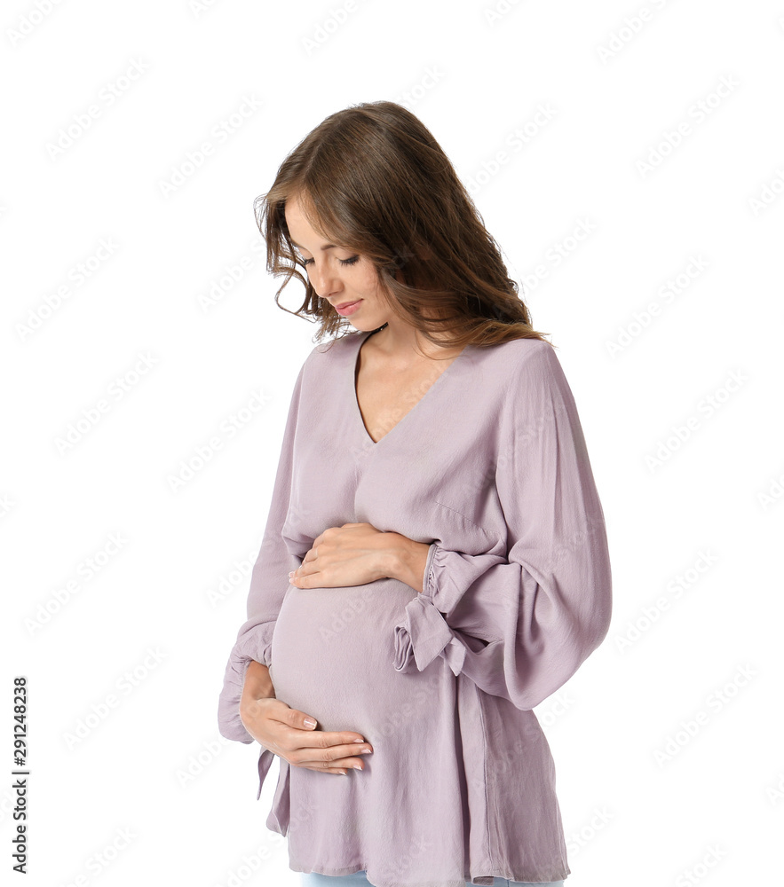 Young pregnant woman on white background