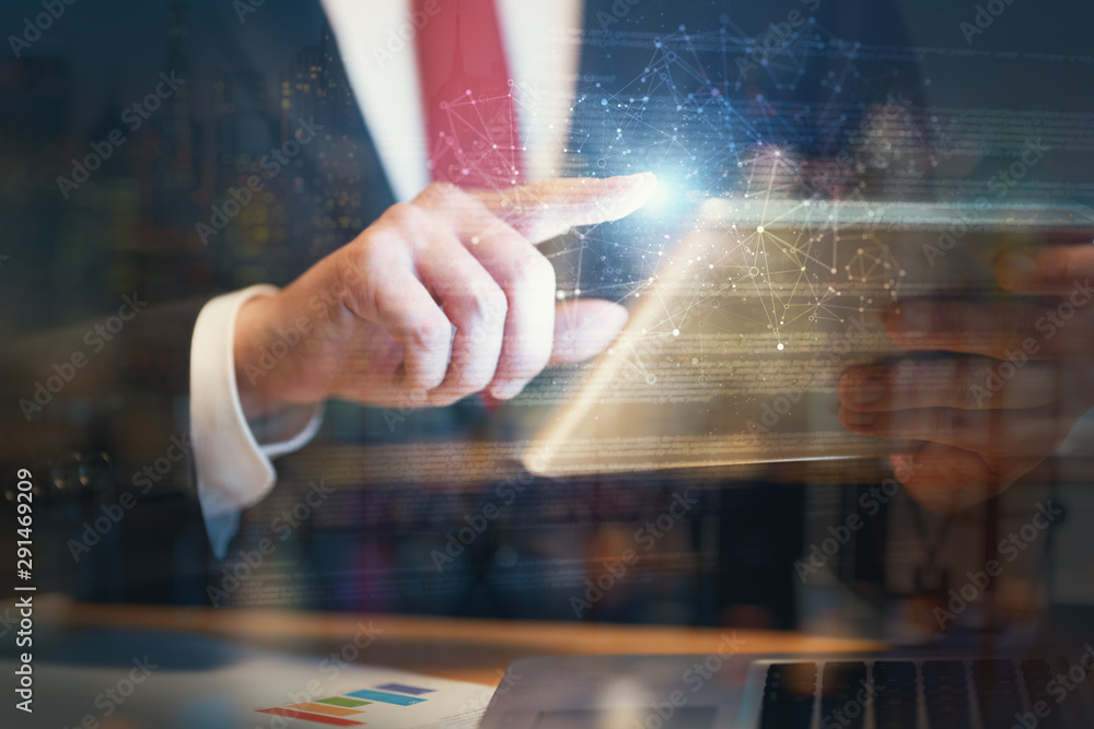 Businessman using tablet.