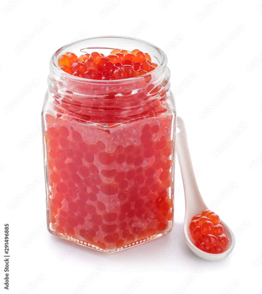 Jar with red caviar on white background