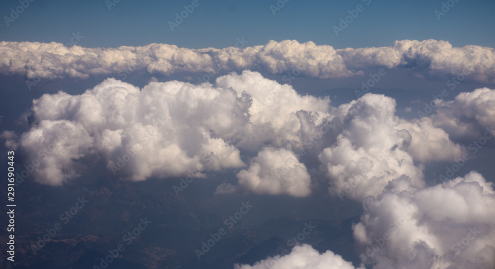 Мiew from an airplane above the clouds