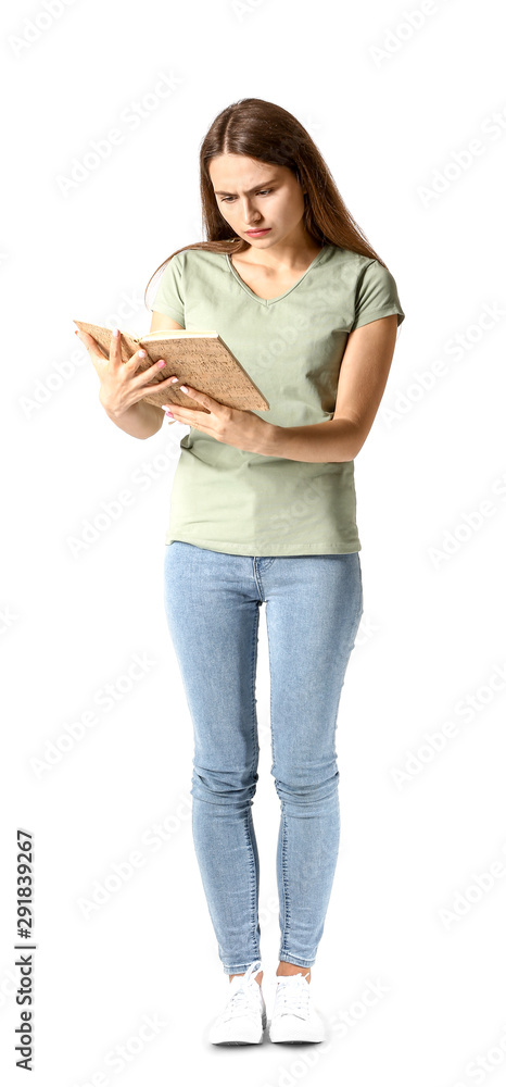 Young girl with book on white background