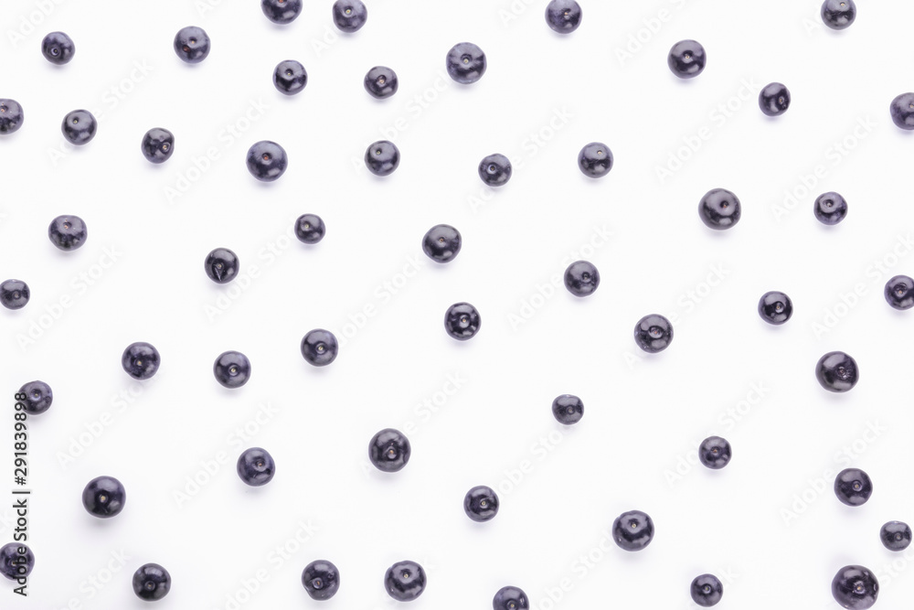 Fresh acai berries on white background