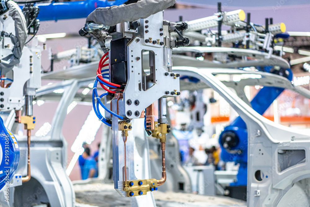 robot arm working in car factory