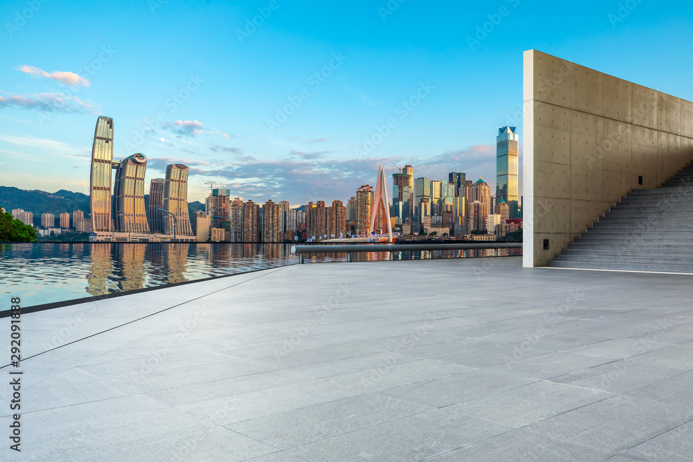 Empty square floor and cityscape with buildings in Chongqing at sunset,China.