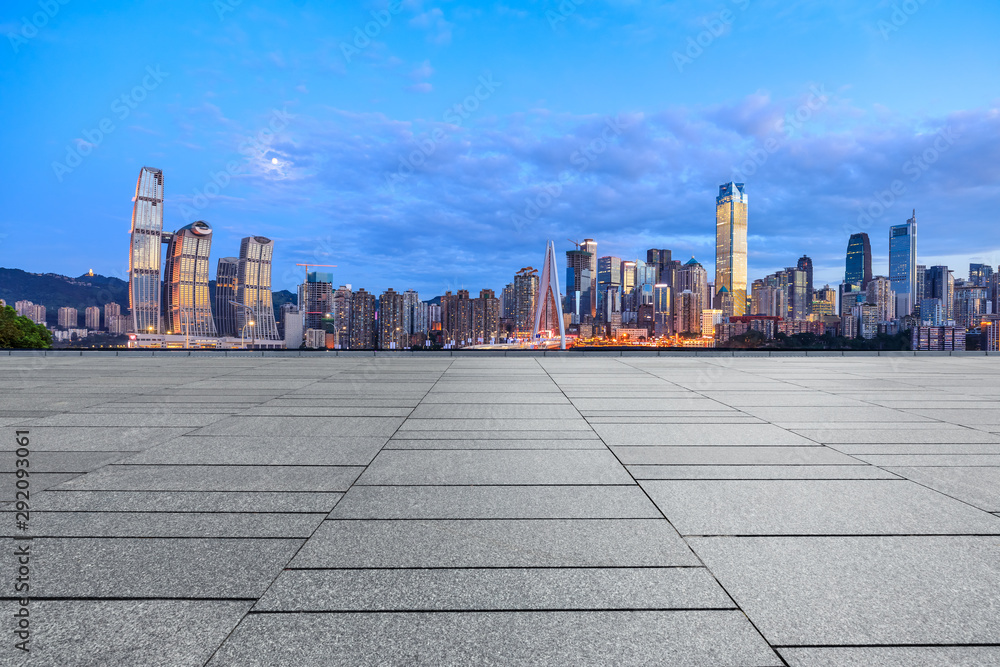 Empty square floor and cityscape with buildings in Chongqing at night,China.