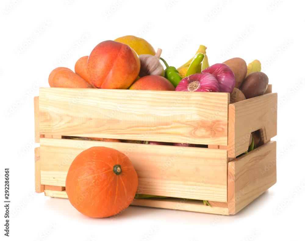 Many healthy vegetables and fruits in box on white background