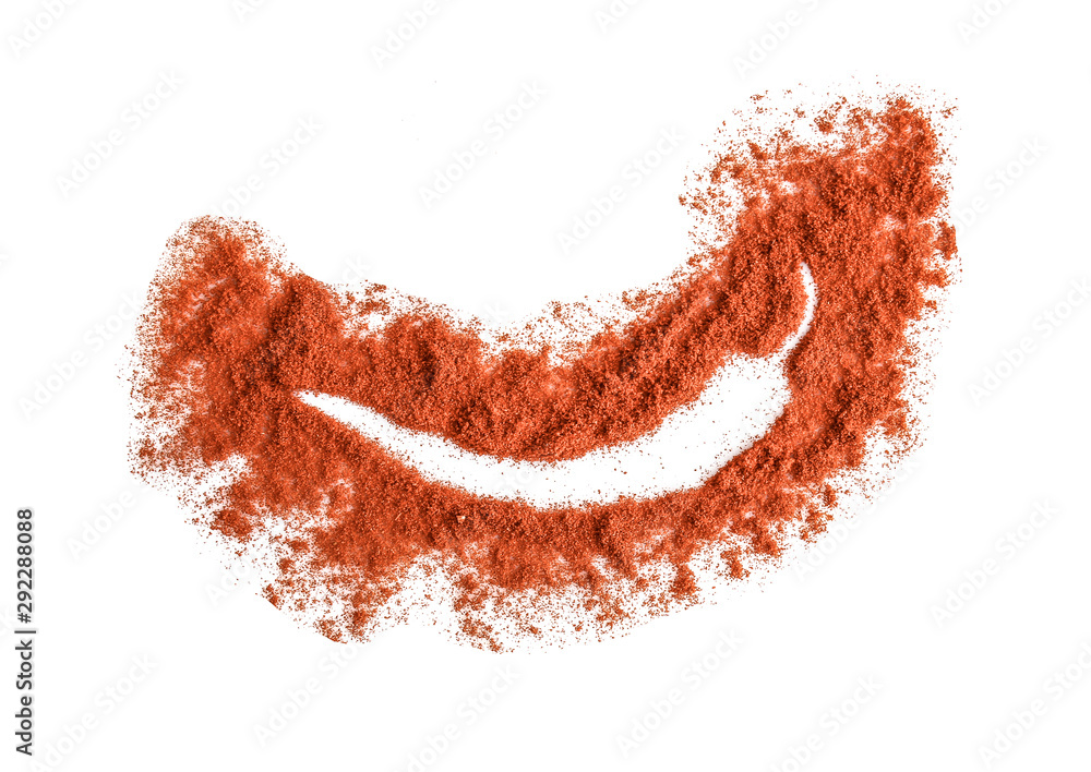 Shape of pepper made with chili powder on white background