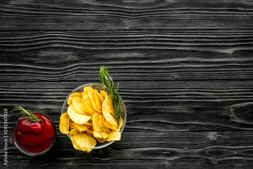 Potato crisps with tomato sauce on wooden background top view mockup