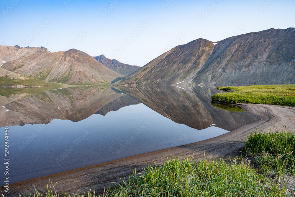 Picturesque mountain lake on Kamchatka. Ketachan Lake, in the area of Ichinsky volcano