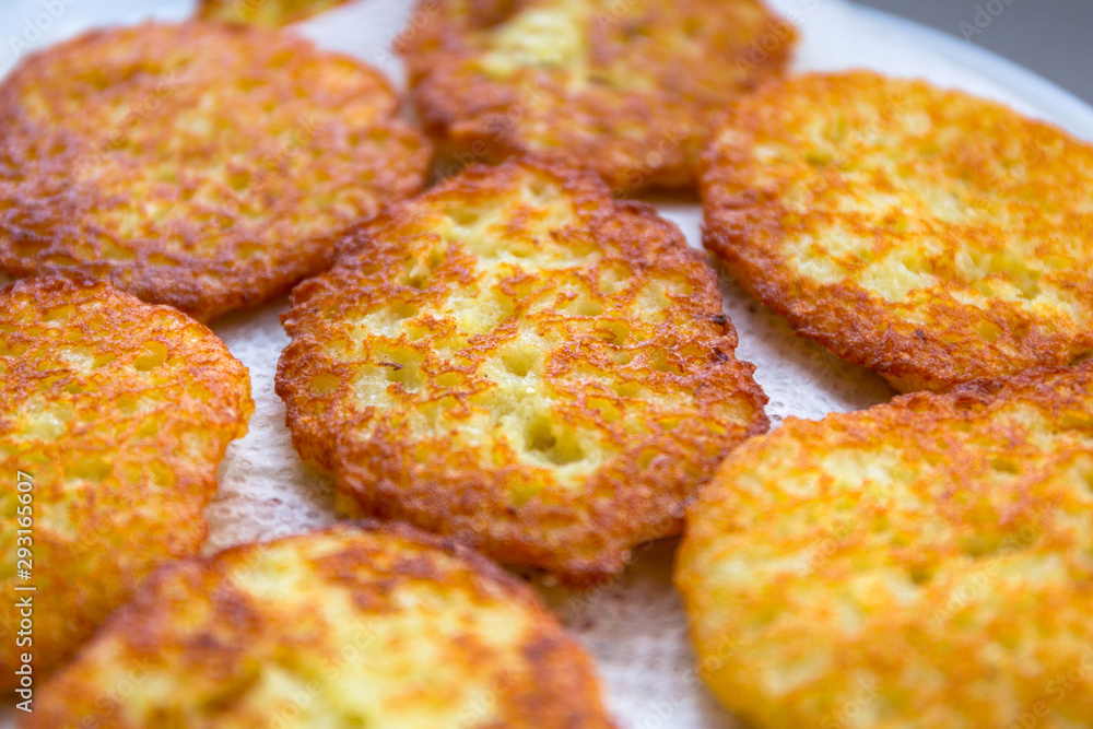 Freshly  fried hash browns on a paper napkin