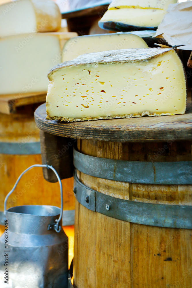 assortment of tomme of ewes sold in market in provence,france-with text ewes milk -from savoy,truffe