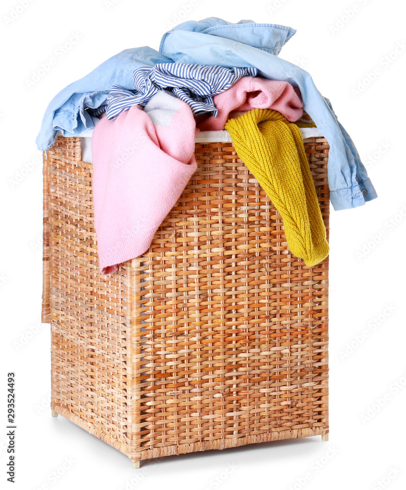 Basket with laundry on white background