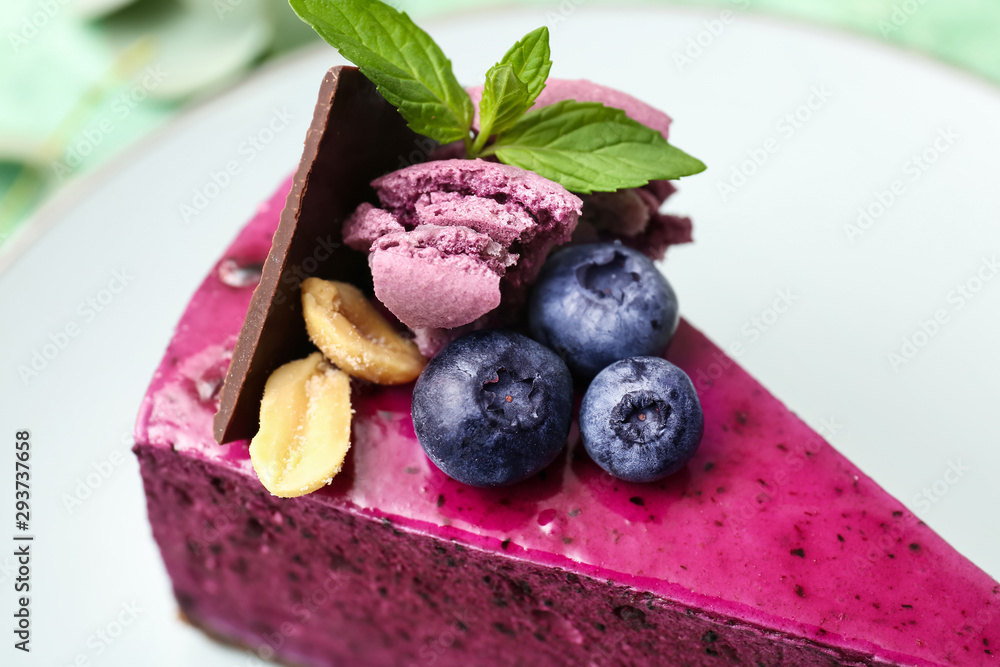 Tasty blueberry cake on plate, closeup