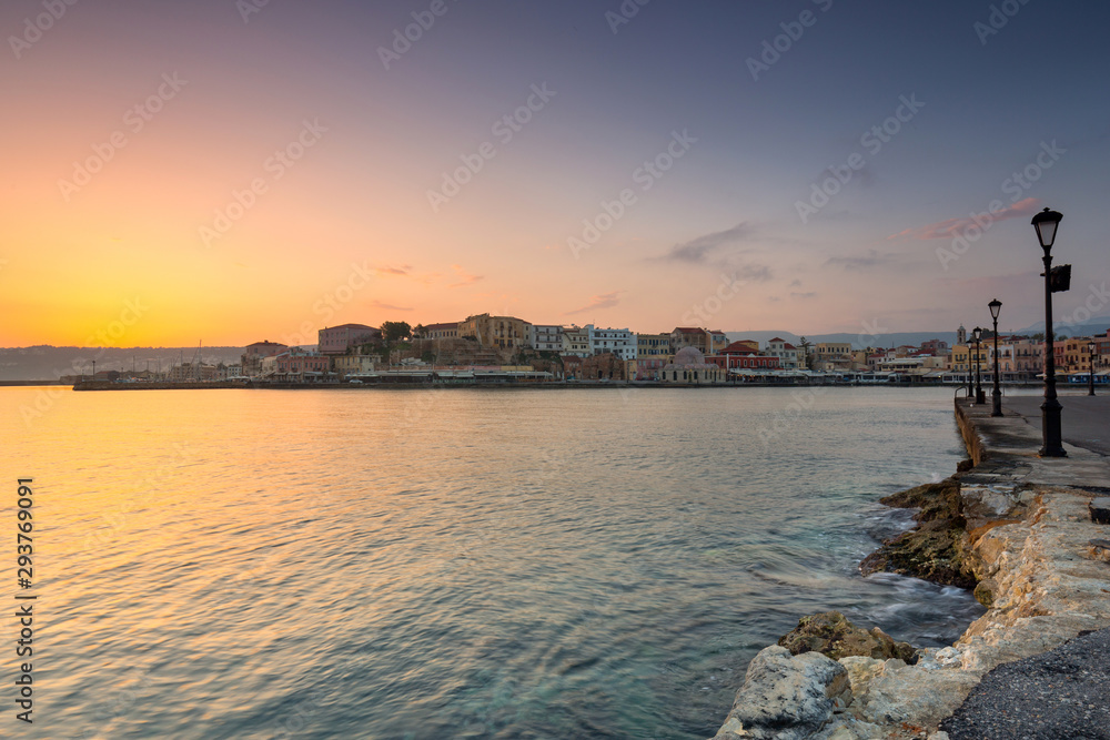 Lighthouse of the old Venetian port in Chania at sunrise, Crete. Greece