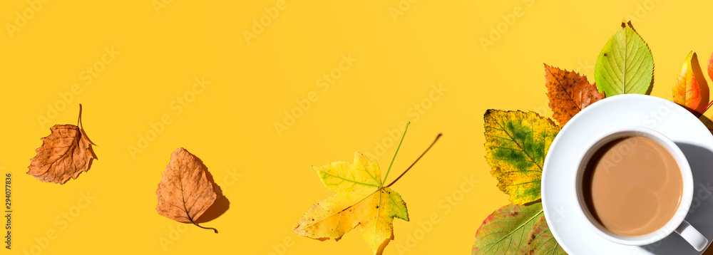 Autumn theme with a cup of coffee - overhead view flat lay