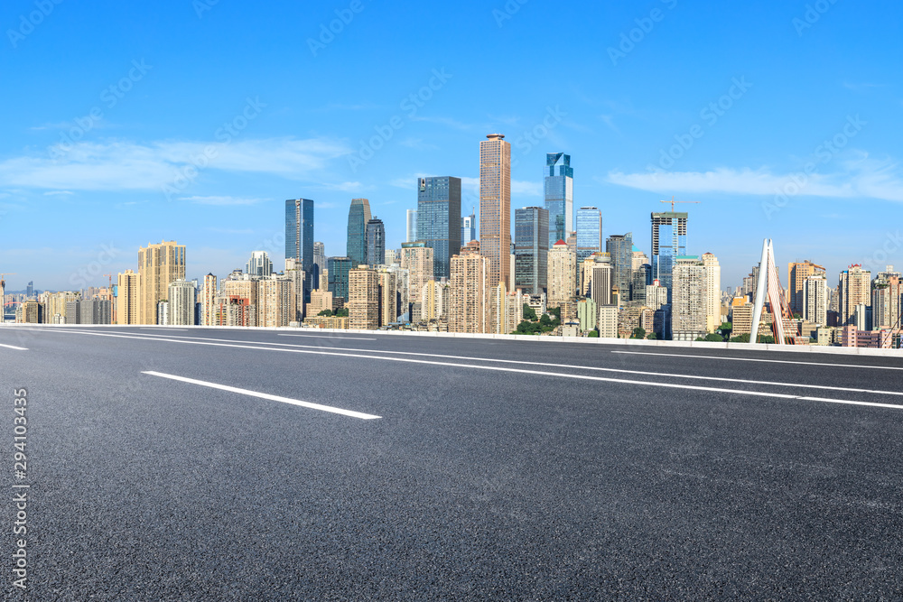 Asphalt highway passes through the city financial district in Chongqing,China.